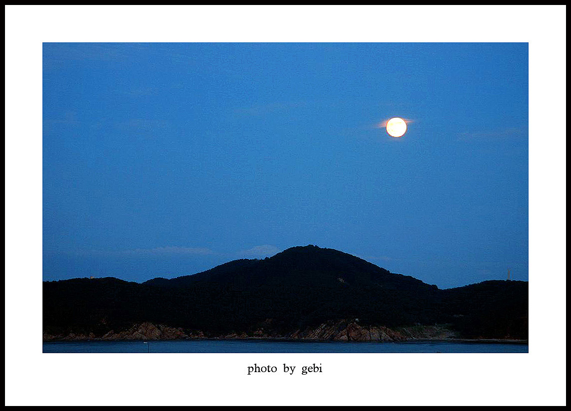 海上升明月