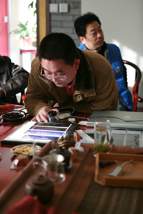 石油人摄影俱乐部1220看片会在一壶知至茶楼举行