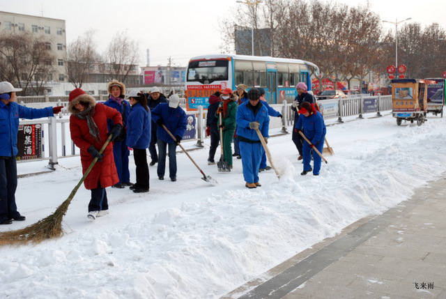 拍雪景去也