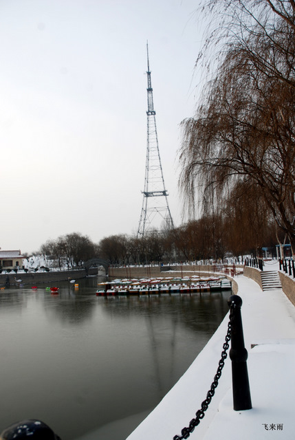 拍雪景去也