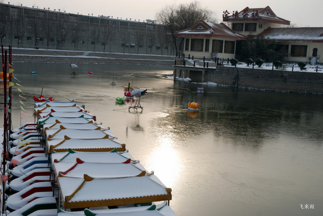 拍雪景去也
