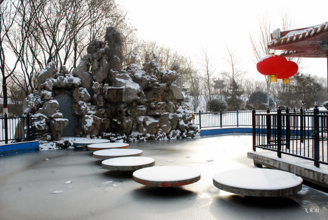 拍雪景去也
